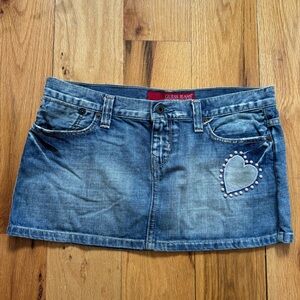 y2k Guess denim mini skirt with pink studs and heart details, size S
